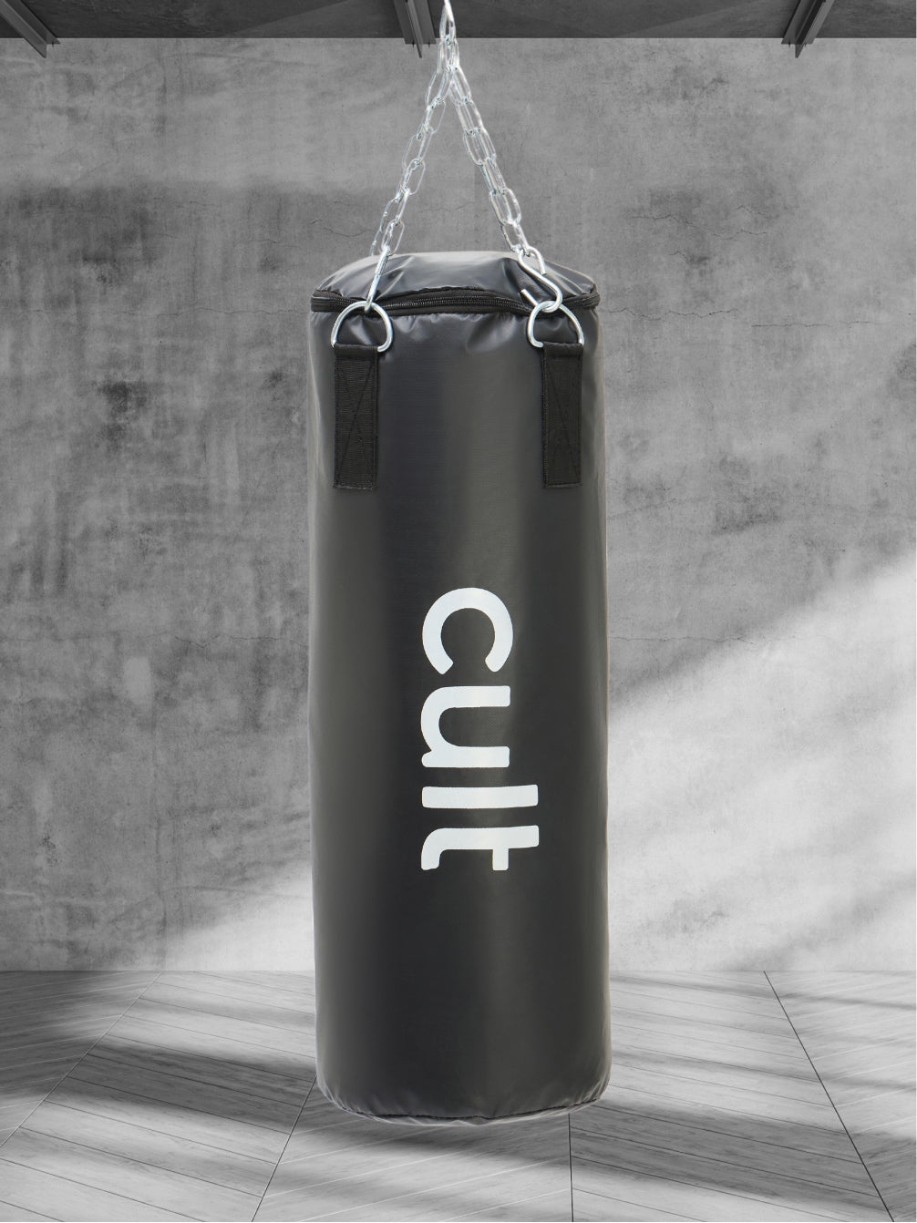 cult Punching Bag Combo for Men & Women 3ft Heavy Bag with Hand Wraps Reinforced Stitching Durable Construction Hanging Chain Unfilled Easy to Install Black