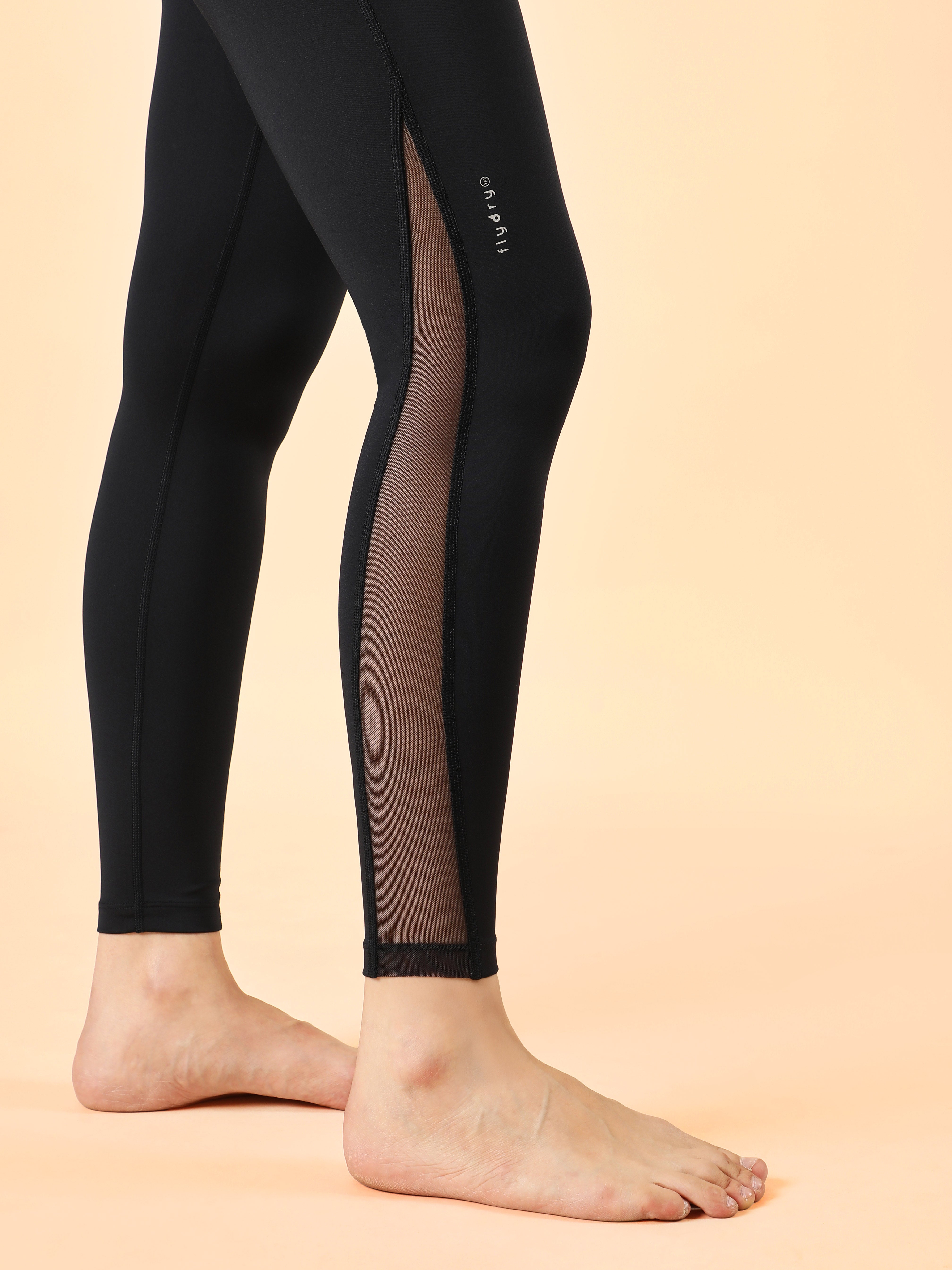 Absolute Fit Solid Black Yoga Tights with Sheer Mesh Panels