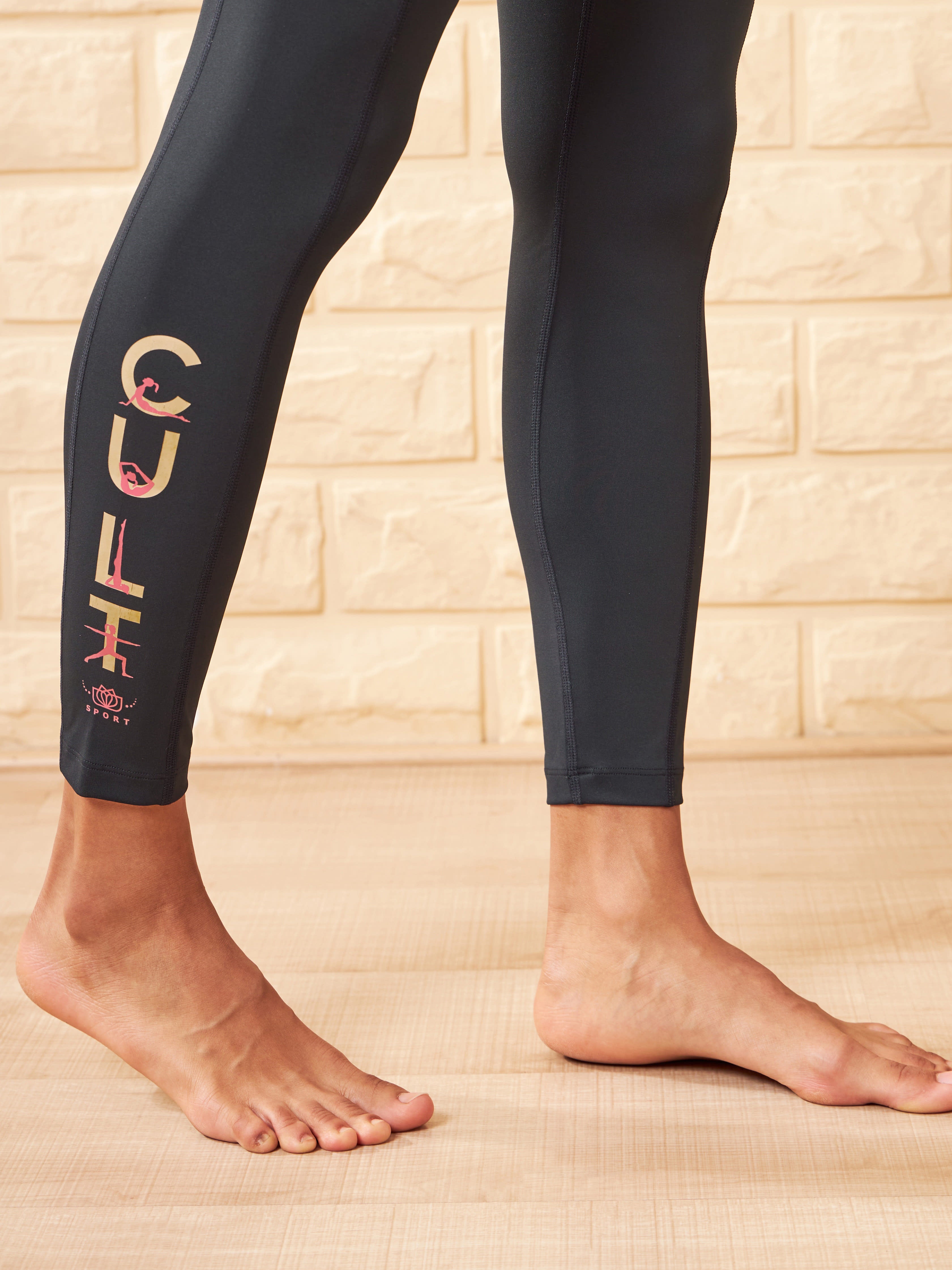 Solid Black Absolute Fit Yoga Tights with Logo Print