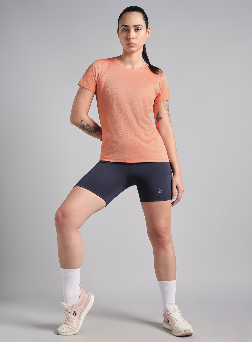 Women's Peach Performance T-Shirt with Minimal Graphic