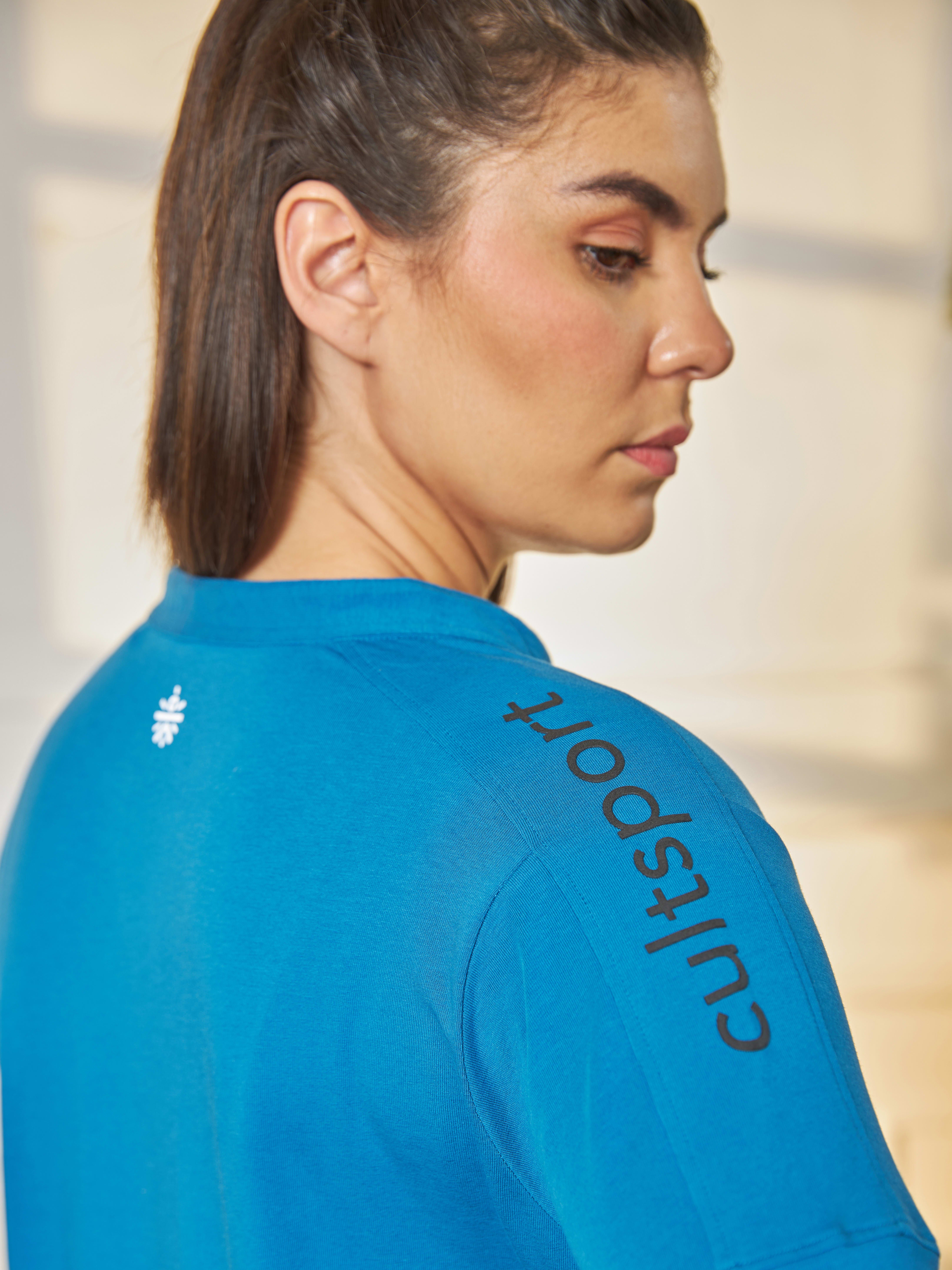 Women Solid Blue Activ-Kurti with Side Pocket